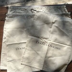 Dooney & Bourke 4 Cream Dust Bags. 2 extra large, 2 medium